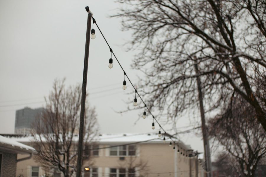 The neighborhood and the city are working together to install low-powered string lights in darker areas. 