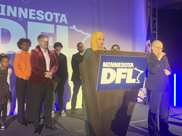 Newly reelected Rep. Ilhan Omar thanked attendees of the DFL party alongside new Hennepin County Attorney Mary Moriarty.