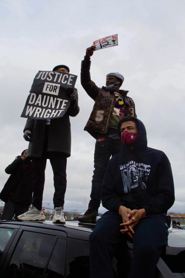 Following the police killing of 20 year old Daunte Wright, protests formed outside the Brooklyn Center Police Department and Kenyan Community SDA Church on Monday, April 12.