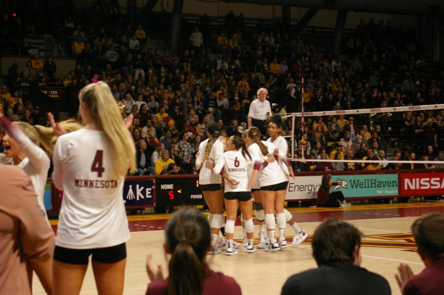 The Minnesota Volleyball team huddles up in between plays during their game against Michigan, Friday, Nov. 4. The Gophers won, 3-0. 